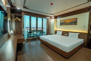 Habitación Deluxe, vistas a la ciudad | Cortinas opacas y sistema de insonorización