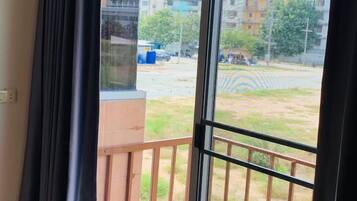 Kamar Single, balkon, pemandangan laut terbatas | Teras/patio