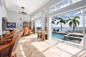 Outdoor pool, a heated pool - TikiTime Tropical Riverfront Retreat (Cape Coral)