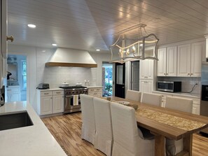 Fridge, microwave, oven, stovetop - Golf course home in Raintree Country Club. Outdoor oasis with pool and hot tub. (Charlotte)