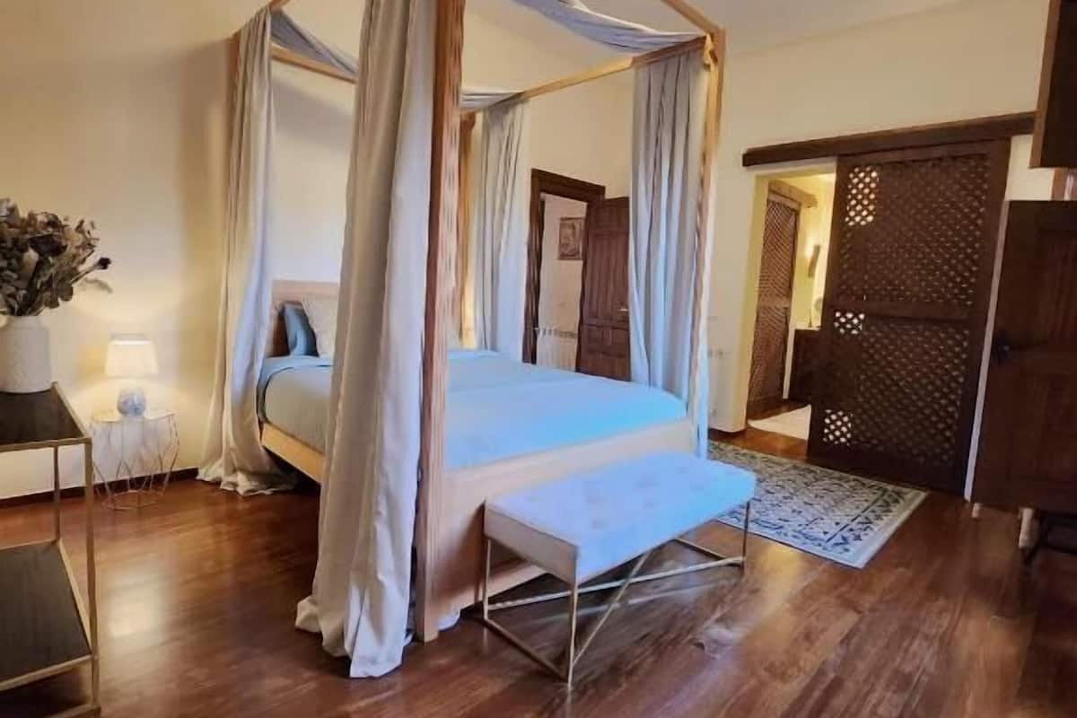 Deluxe suite, balkon, uitzicht op tuin | Gratis wifi