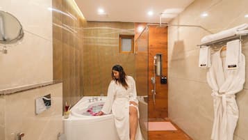 Presidential Room, Pool View | Bathroom | Towels, soap, shampoo, toilet paper