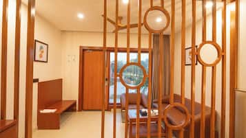 Family Studio Suite, Garden View | Desk, laptop workspace, free WiFi