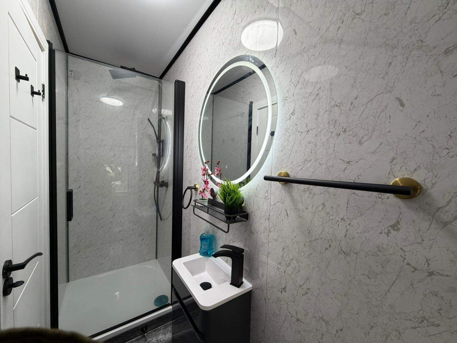 Shower, towels, toilet paper