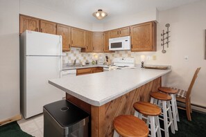 Fridge, microwave, oven, stovetop - NEW split-level 3 bedroom in Fraser with private deck (Fraser)