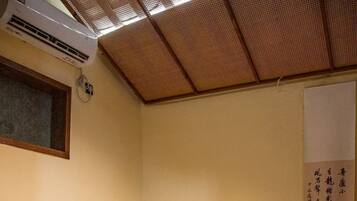 Signature Suite, Courtyard View | Desk, laptop workspace, blackout drapes, iron/ironing board