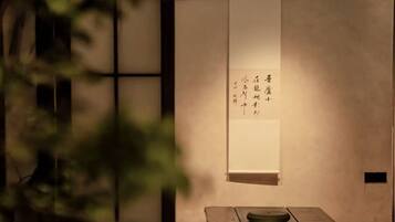 Signature Suite, Courtyard View | Desk, laptop workspace, blackout drapes, iron/ironing board