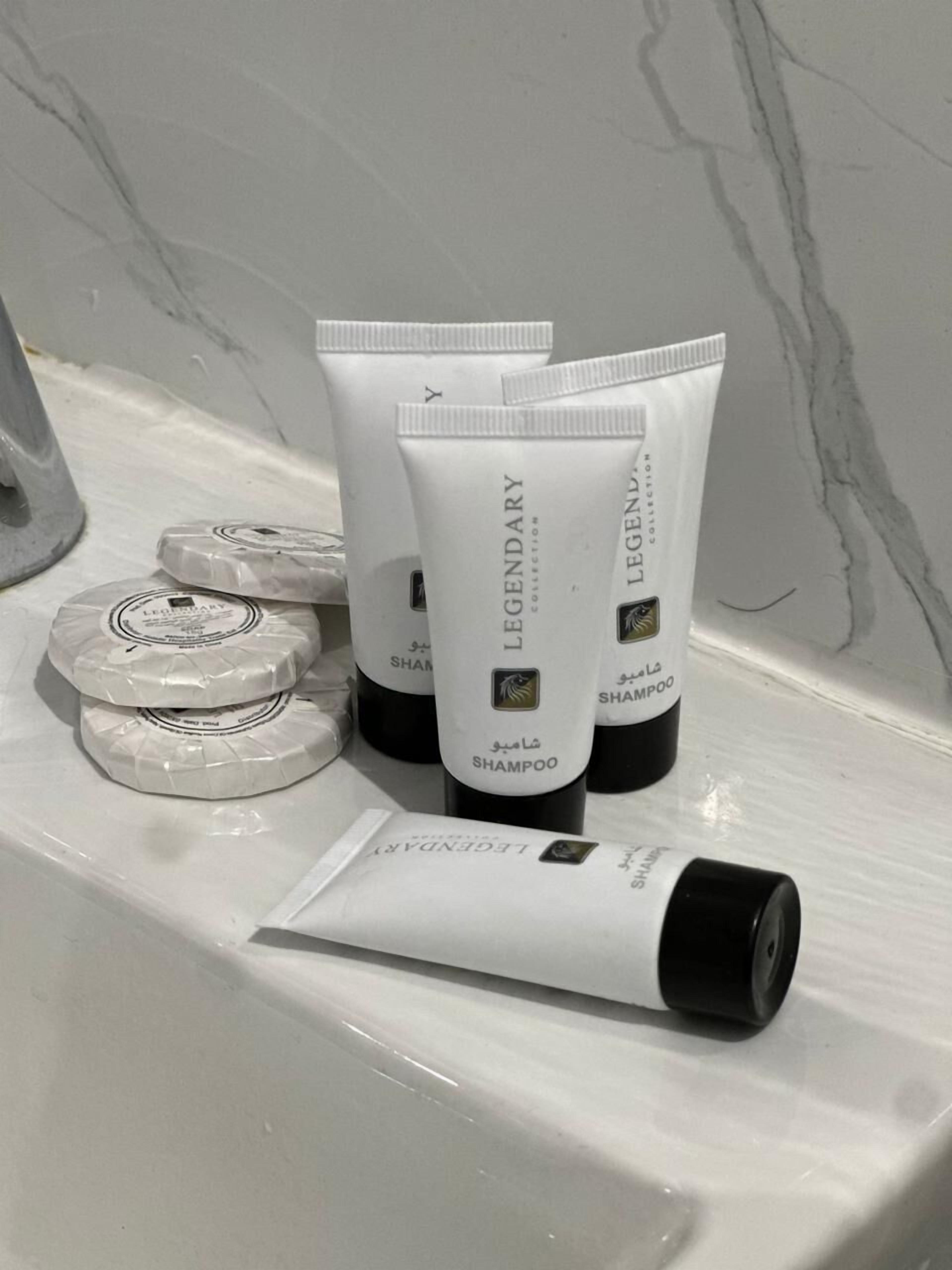 Separate bathtub and shower, slippers