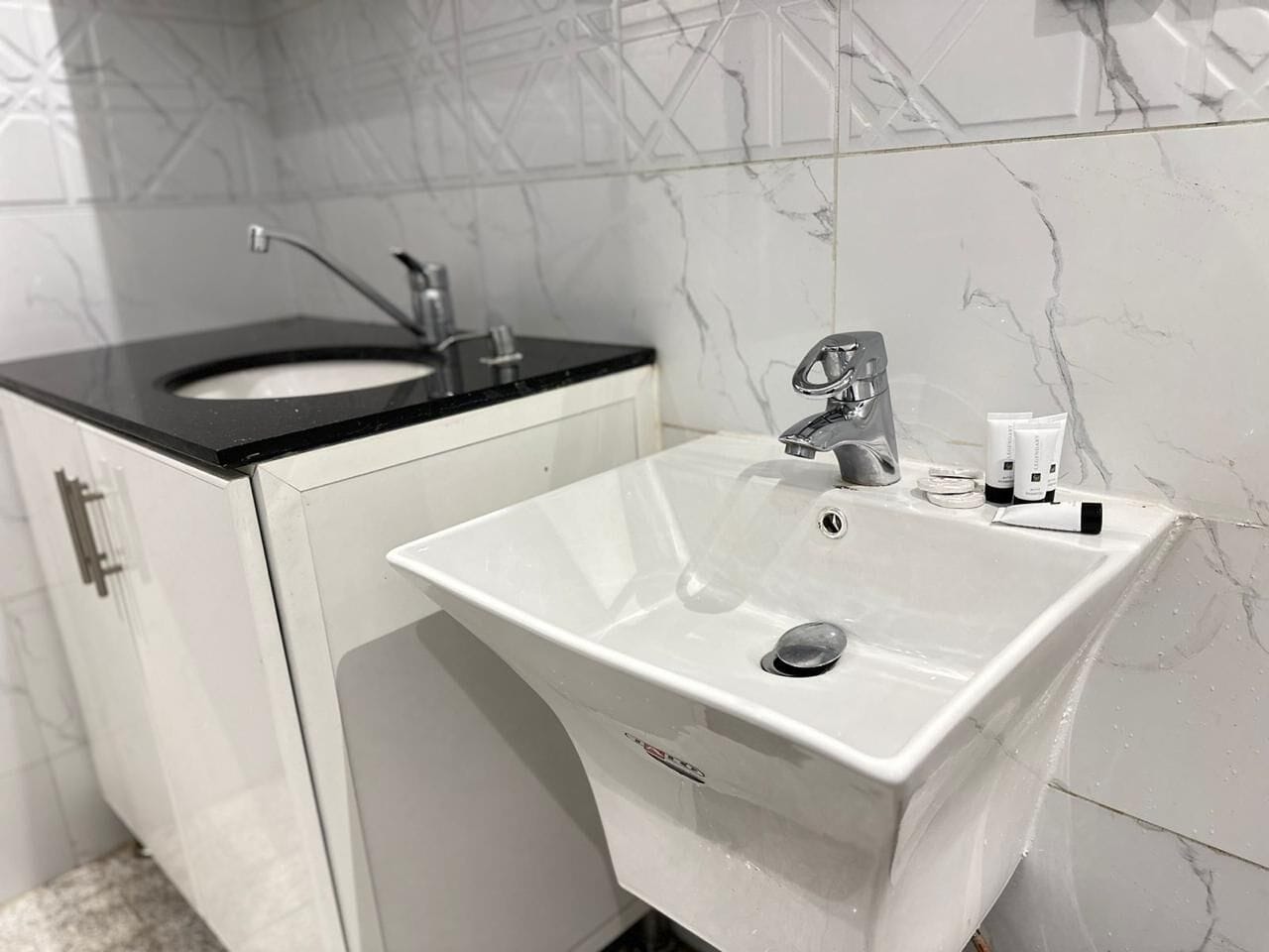 Separate tub and shower, slippers