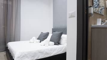 Chambre Deluxe | Coffres-forts dans les chambres, rideaux occultants