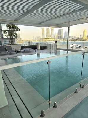 Outdoor pool - Luxury Penthouse Retreat - Private Beach, Breathtaking Palm and Marina Views (Dubai)