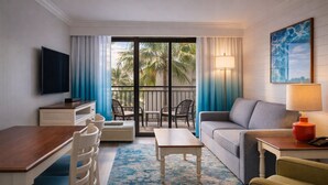 A hotel room with a balcony, a TV, a sofa, a dining table, and a coffee table. - Condo with Balcony Views Near SkyWheel, Aquarium & Myrtle Beach Board - 4 Units (Myrtle Beach)