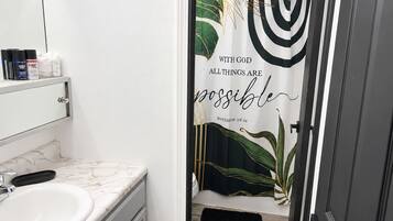 Hair dryer, towels, soap, shampoo
