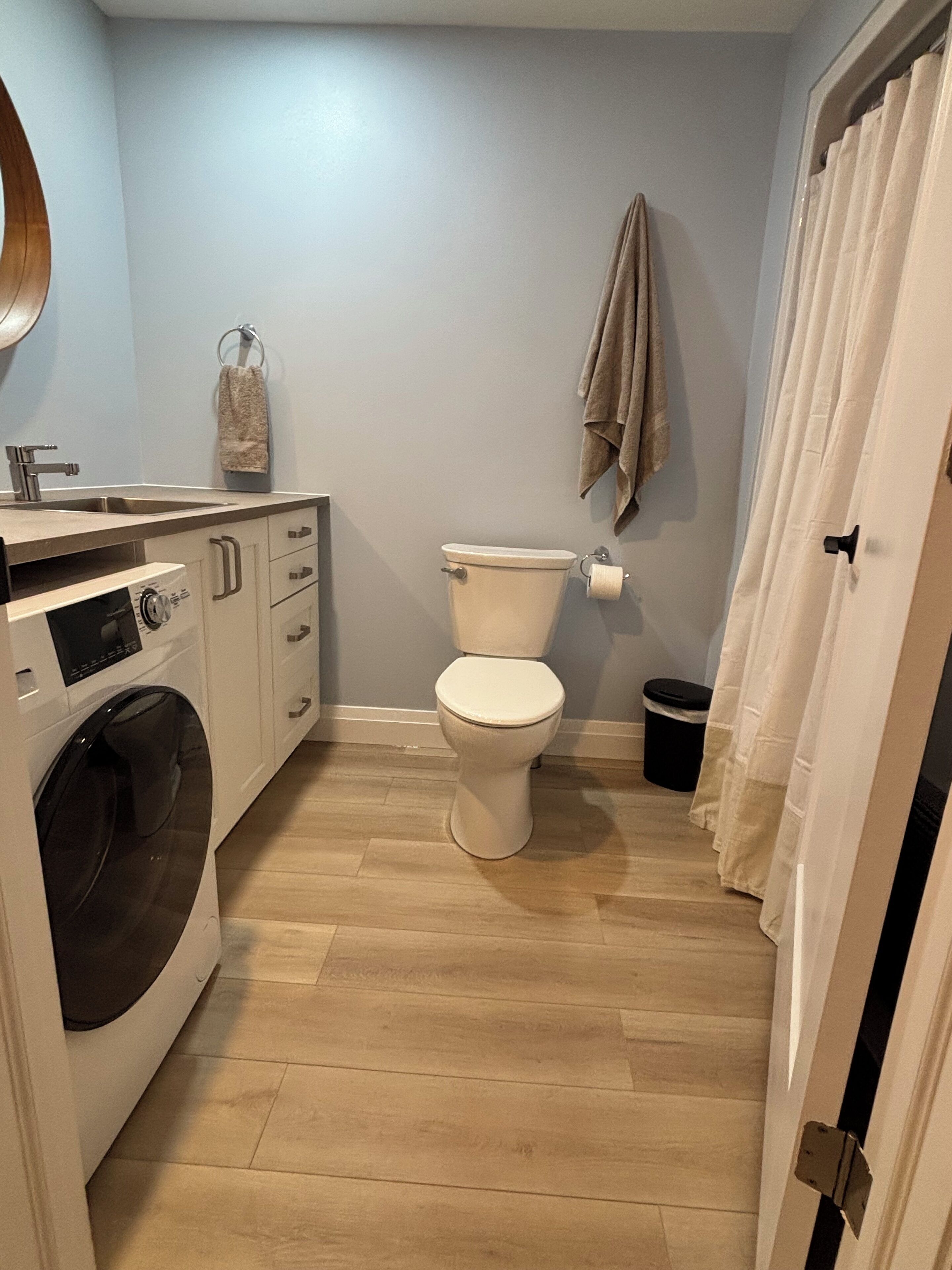 Hair dryer, towels, soap, toilet paper