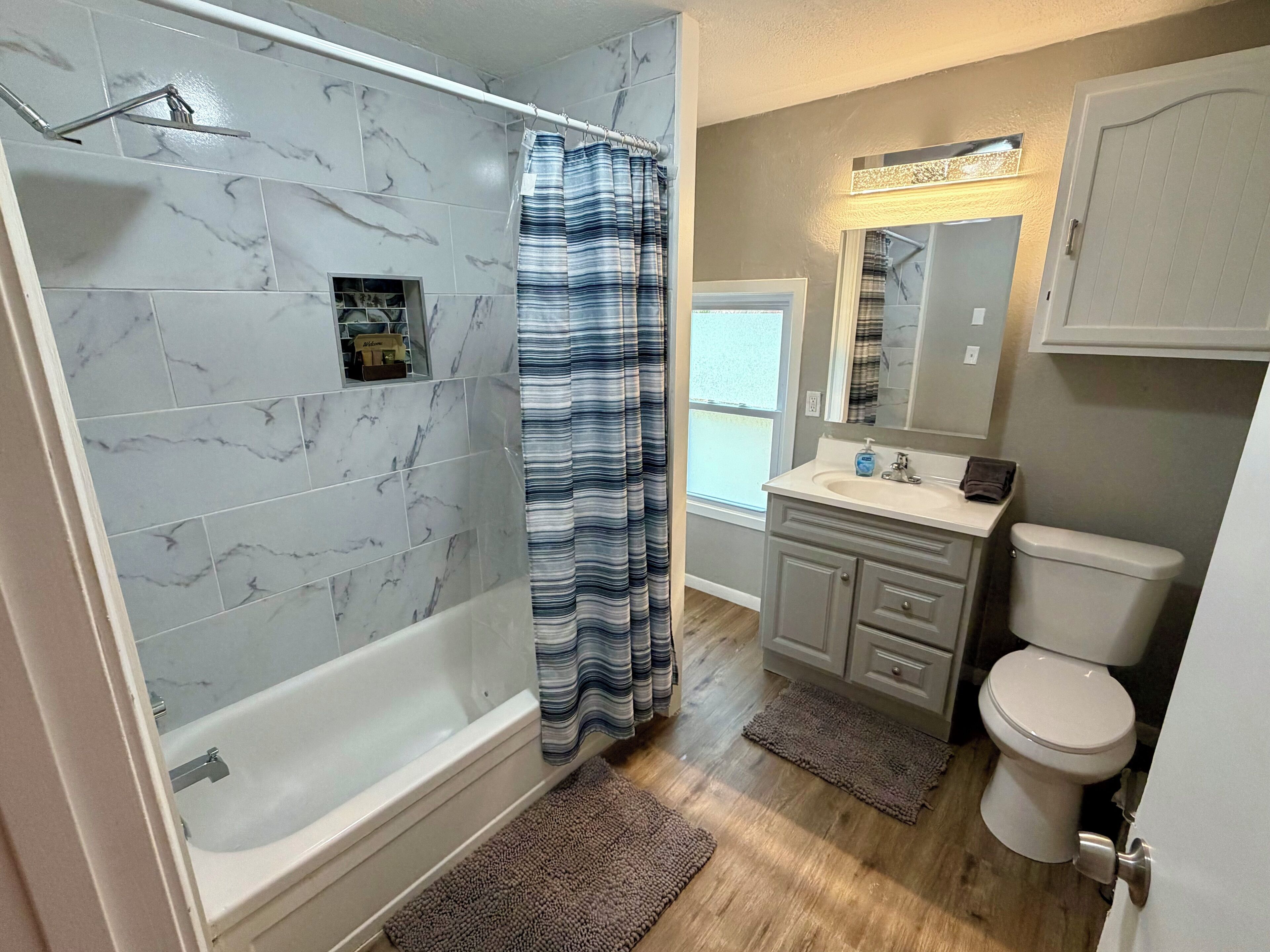 Hair dryer, towels, soap, shampoo