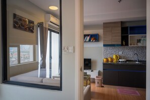 Apartment, Balcony, City View | Private kitchen | Fridge, dishwasher, cookware/dishes/utensils - The Moment Apartment at the Star Polaris (Phnom Penh)