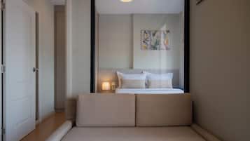 Lägenhet - balkong - utsikt mot staden | Vardagsrum