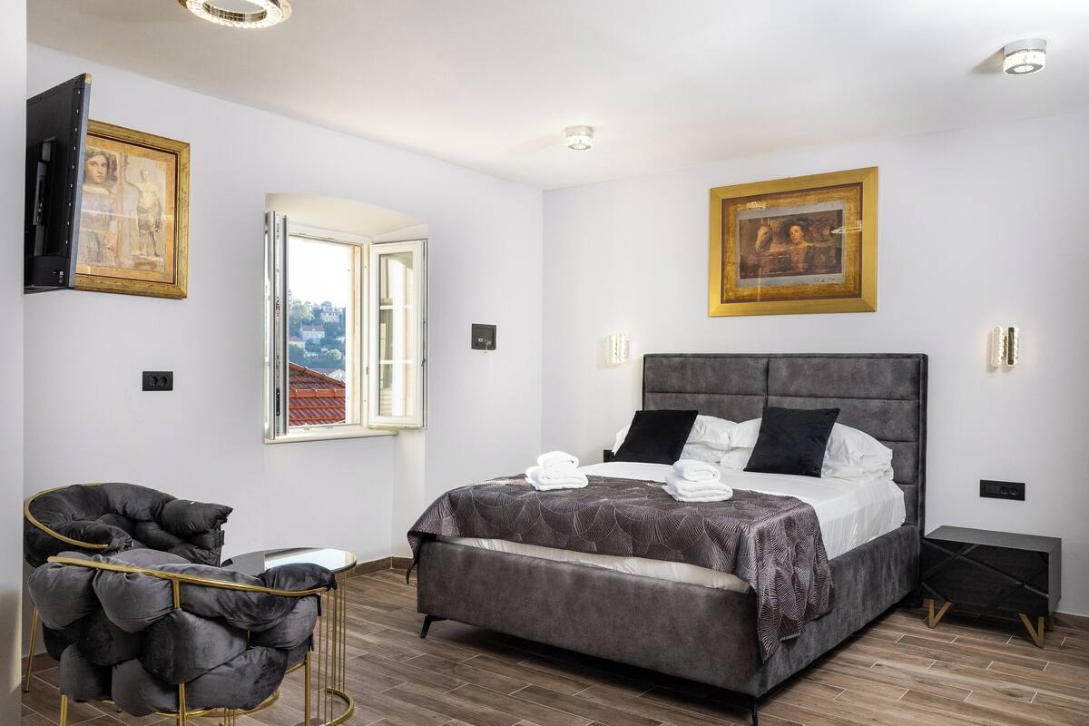 Luxury Double Room, Partial Sea View | In-room safe, iron/ironing board, free WiFi