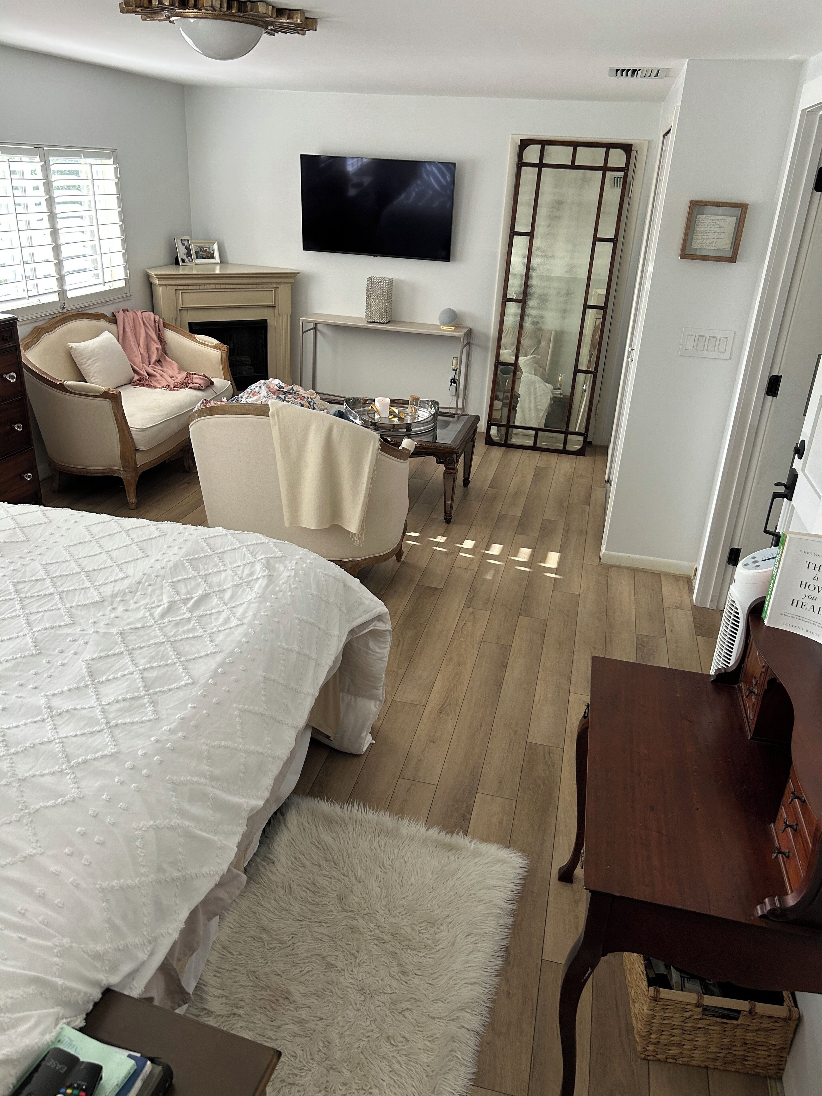 Primary Bedroom with King Size Adjustable Bed, Fireplace, TV & Water Views 