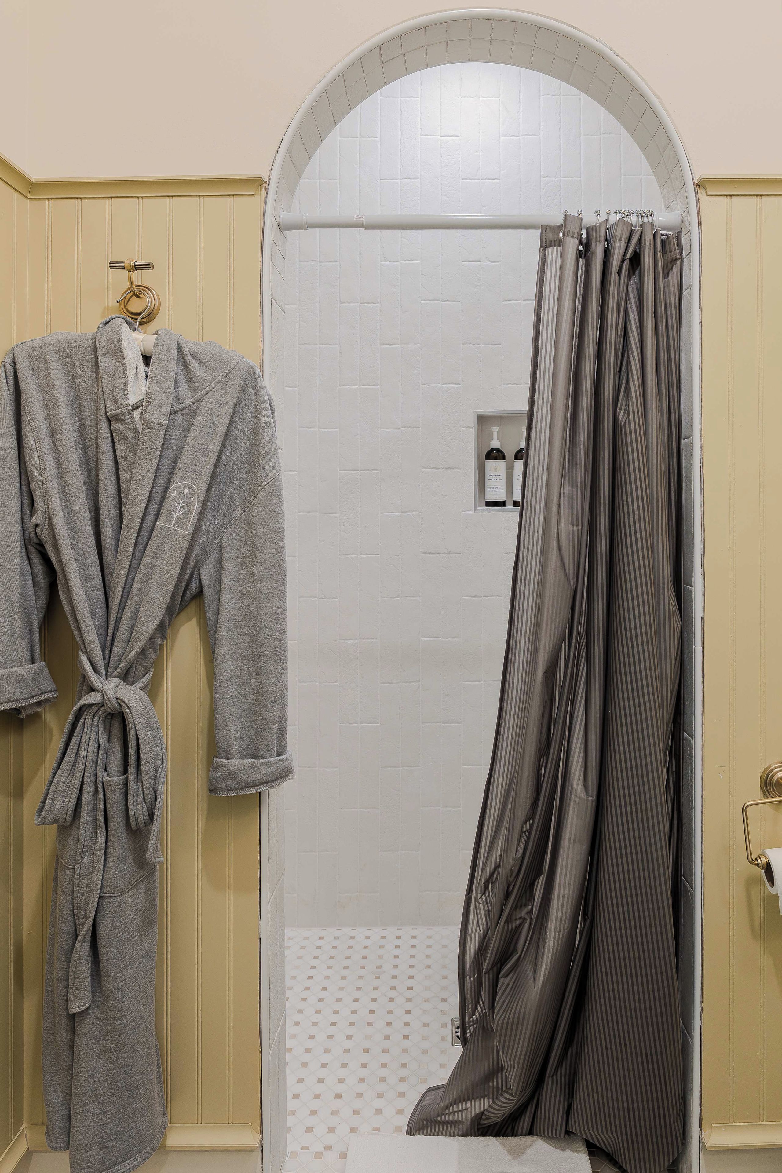 Shower, hair dryer, towels, shampoo