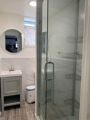 Shower, hair dryer, towels, soap