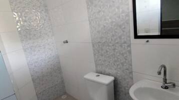 Shower, towels, soap, toilet paper