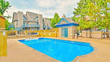 Seasonal outdoor pool, open 9:00 AM to 9:00 PM, pool loungers