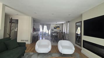 Smart TV, fireplace, books