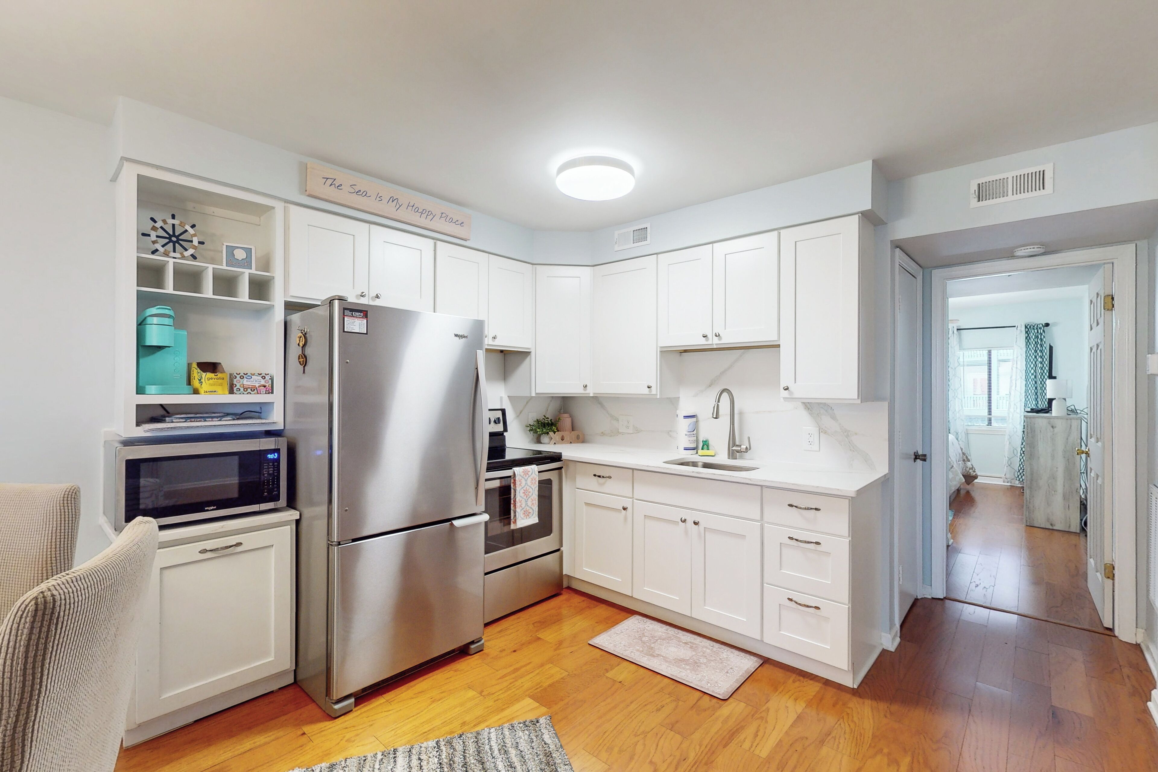 Fridge, microwave, stovetop, coffee/tea maker