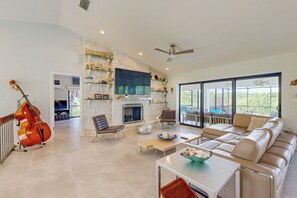 TV, fireplace, table football, books