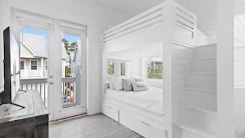 2 dormitorios, tabla de planchar con plancha, cuna de viaje