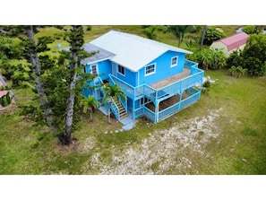 Exterior - Charming 3-bedroom upstairs unit in a house with a shared pool in pine island (Saint James City)