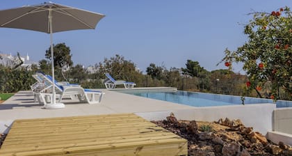 Single story villa, private pool, and walking distance to beach