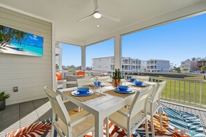 Outdoor dining - ⚓New Listing Discounts! Canal Home-Heated Pool, Game Room, Tesla Charger, & More⚓ (Cortez)