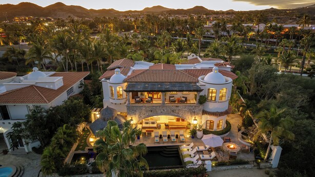 A large, luxurious house with multiple levels, a swimming pool, and a well-maintained garden. - Casa Primera: 6BR Ocean-View Villa, Palmilla Dunes Club Access (San Jose del Cabo)