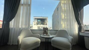 Luxe kamer, uitzicht op de stad | Woonruimte