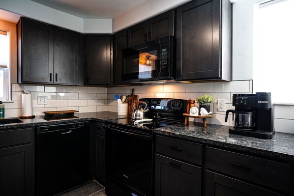 Fridge, microwave, oven, stovetop - Well Located Casper Home Near Downtown District (Casper)