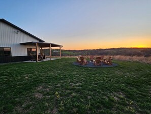 Property grounds - Modern home on acreage with pond, trails, rolling hills, and sunset views (Winterset)
