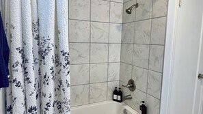 Hair dryer, towels, soap, toilet paper