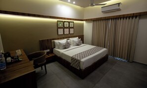 Deluxe Double Room, Balcony, Garden View | In-room safe, desk, laptop workspace, blackout drapes - Madhuvan Resort (Talala)