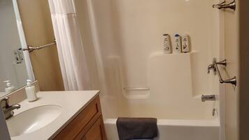 Shower, towels, soap, toilet paper