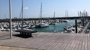 A marina with numerous boats docked along a wooden pier. - Mimosa 2 bedrooms 33m² + TV 4 persons (ST PIERRE D OLERON)