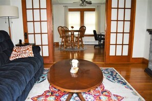 TV, fireplace, books - Quiet Downtown Apt w/ Fireplace (Waterville)