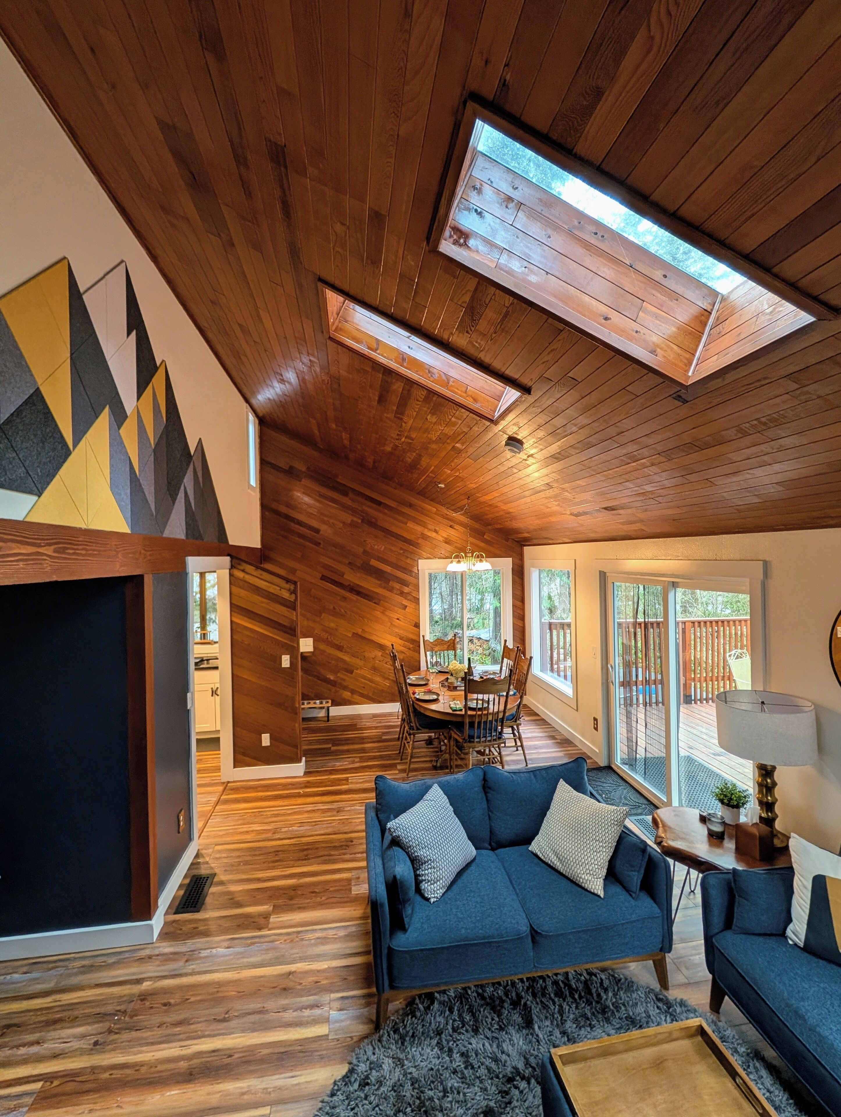 Smart TV, fireplace, books, computer monitors