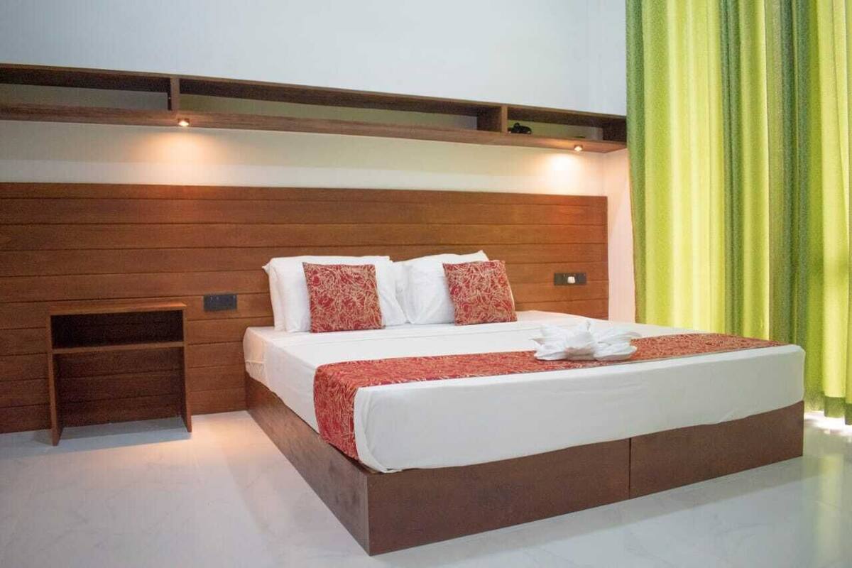 Deluxe Double or Twin Room, Pool View | In-room safe, desk, laptop workspace, blackout drapes