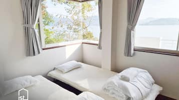 4 bedrooms, iron/ironing board, travel cot, WiFi