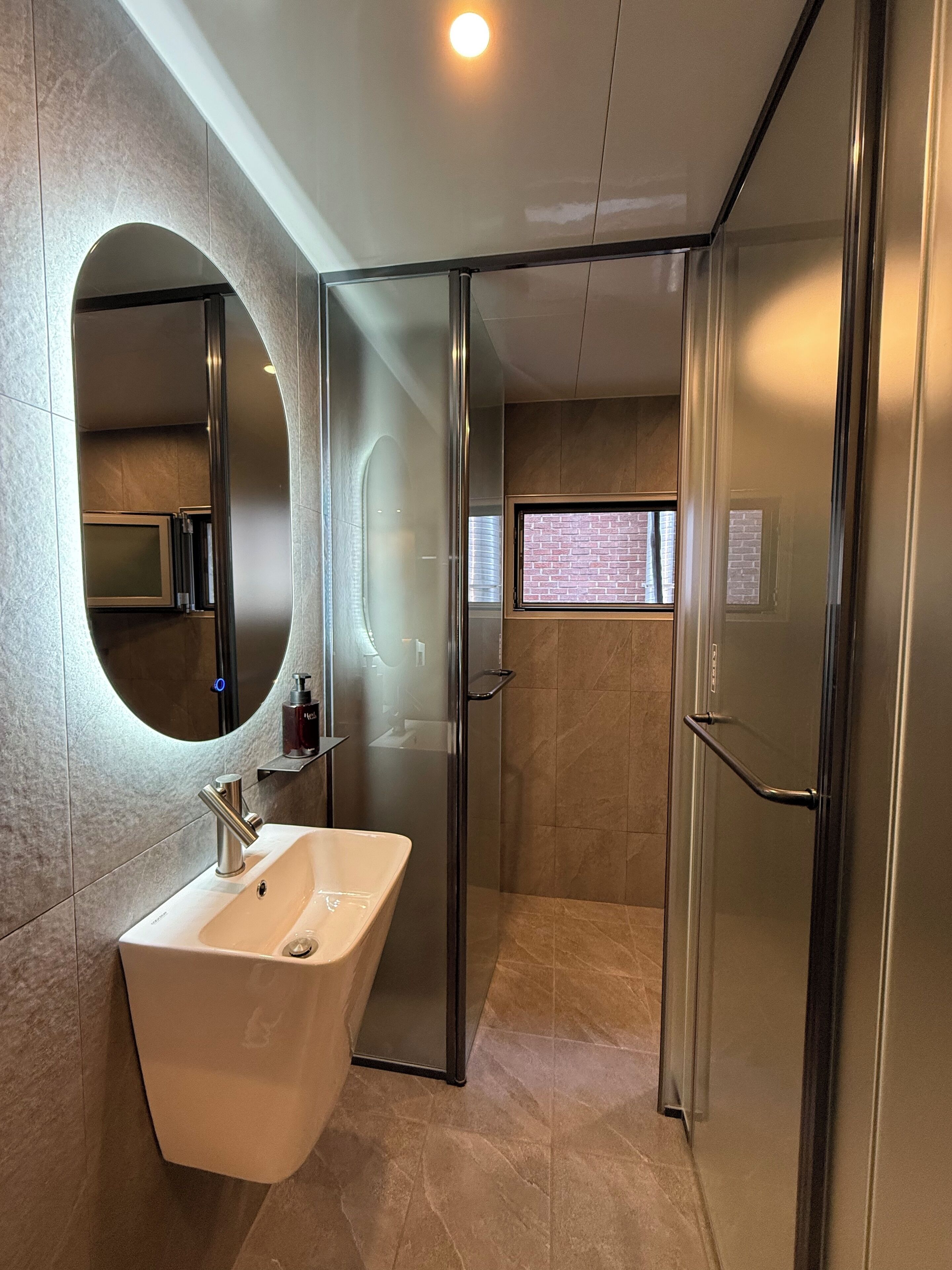 Shower, eco-friendly toiletries, hair dryer, towels