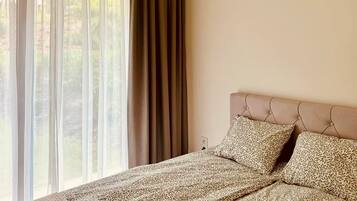 1 chambre, fer et planche à repasser, Wi-Fi gratuit, draps fournis