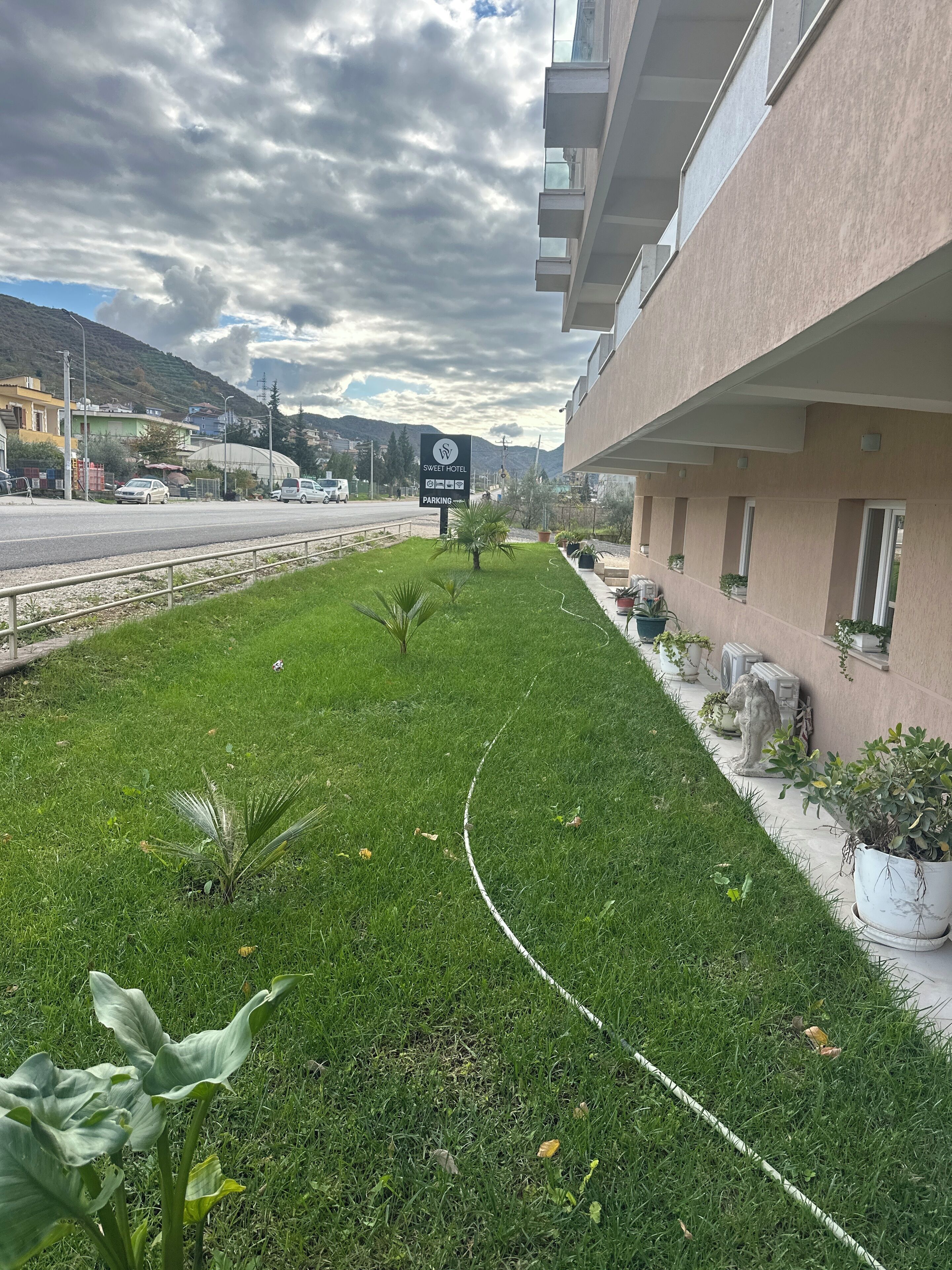 Habitación con 1 cama matrimonial o 2 individuales, balcón, vista al jardín | Vista desde la habitación