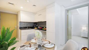 Luxury Apartment, Balcony, Pool View | In-room dining